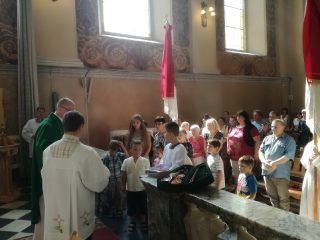 Wprowadzenie nowego proboszcza i poświęcenie tornistrów